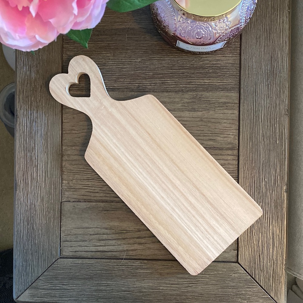 Heart cut out wooden serving board